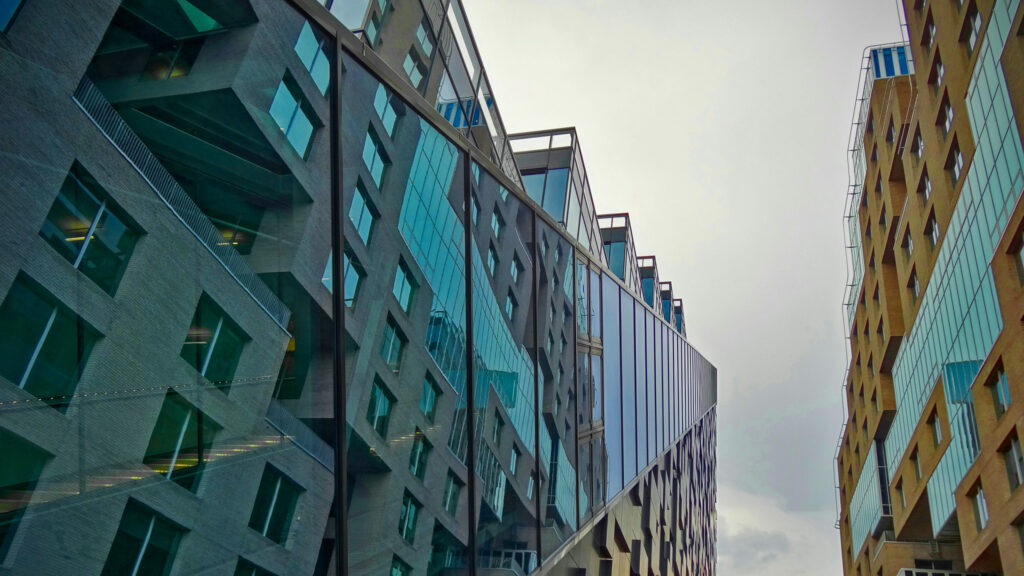 High-rises in downtown Oslo seen from the ground up.